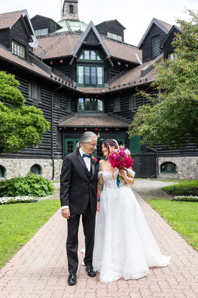 Bride and groom after their first look in front of the Chateau Montebello, QC